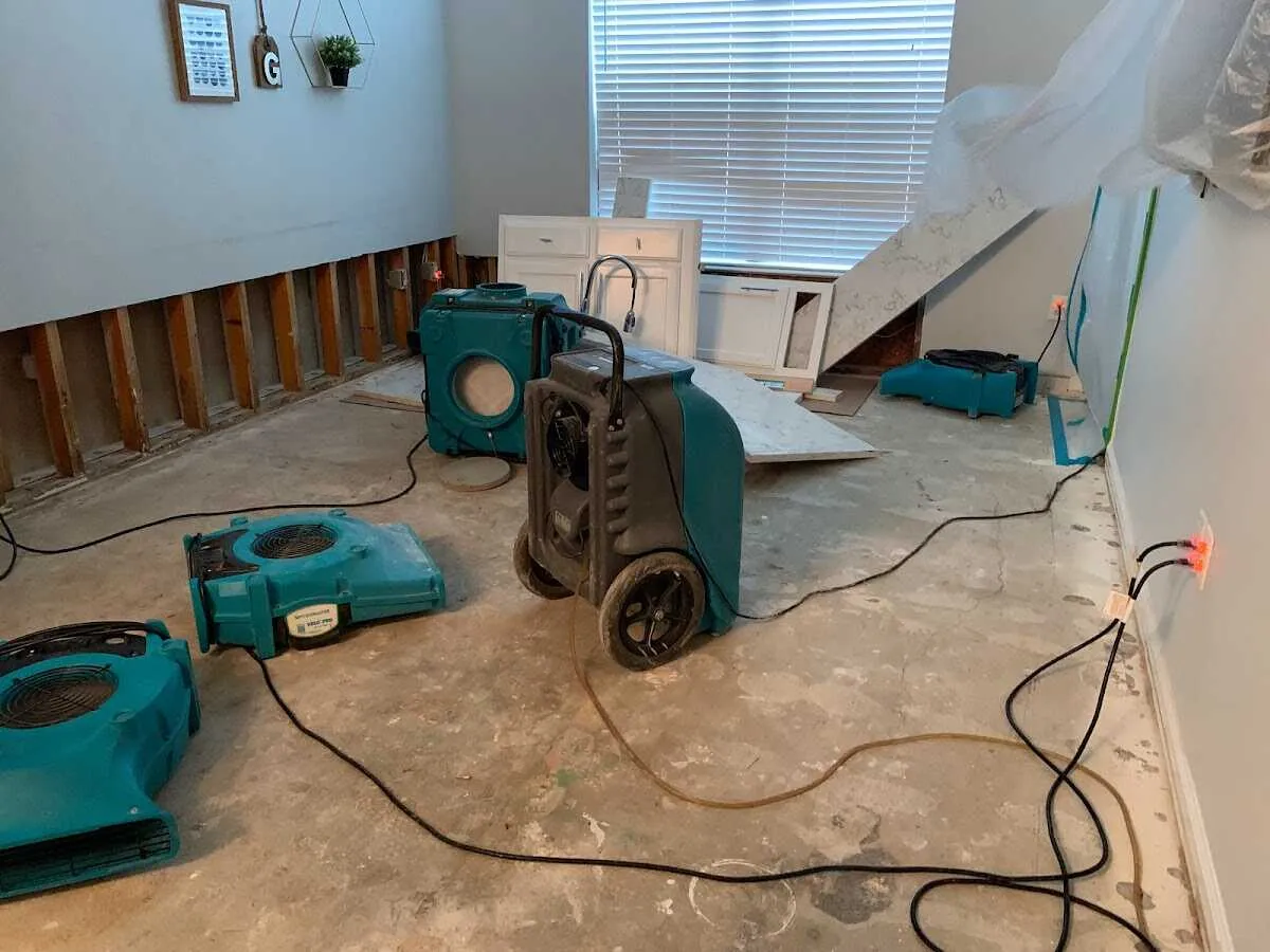 Dehumidifier in flood-cut room for Water Damage Restoration in South Kingstown